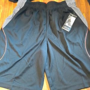 And1 shorts, black with red and white. Size medium.